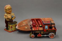 Three battery operated toys; Charlie Weaver, Western Loco and Speedboat. The boat 45 cm long.