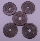Five Chinese coins.