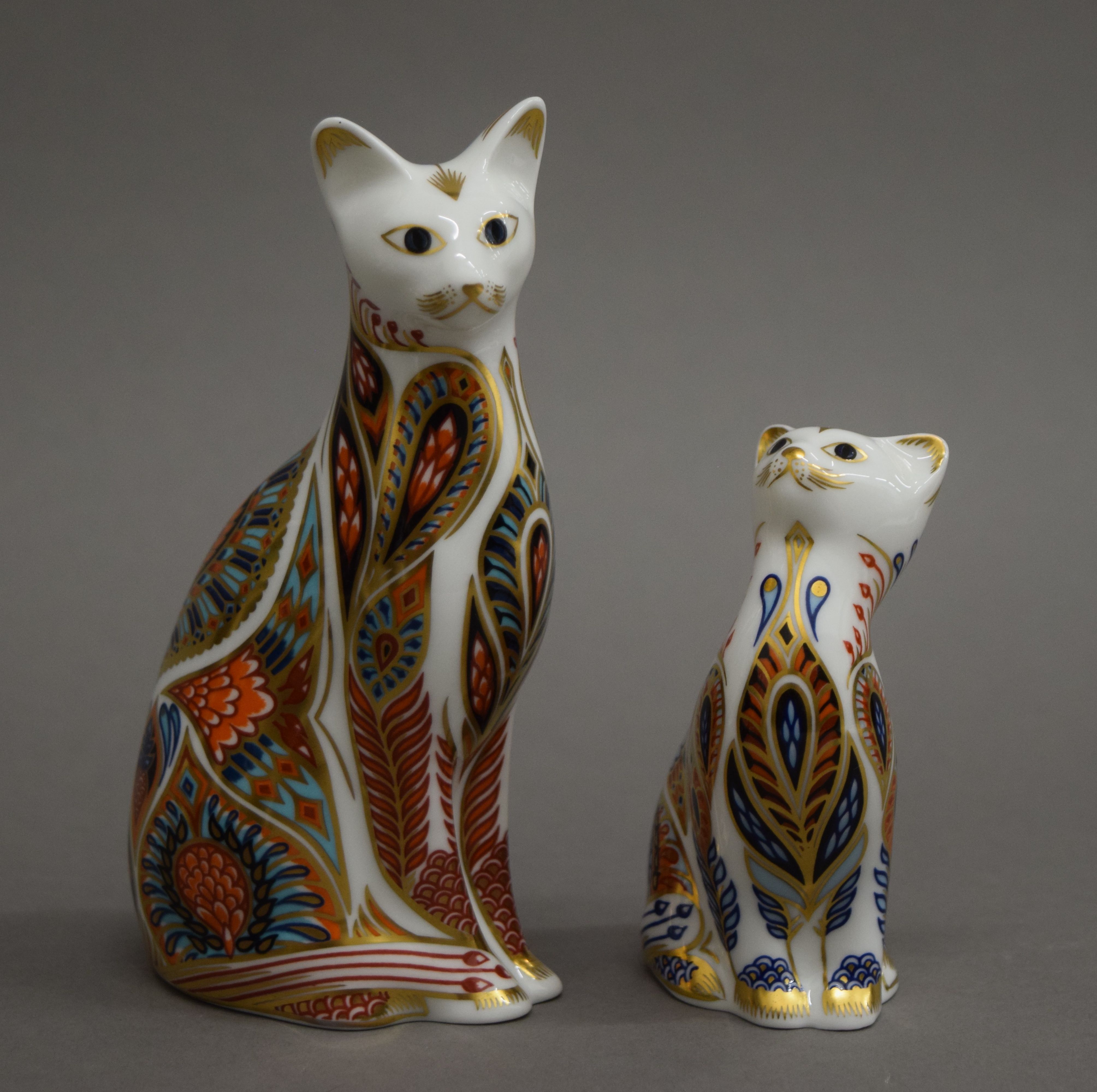 A collection of Royal Crown Derby cat form paperweights. The largest 13 cm high. - Image 4 of 8