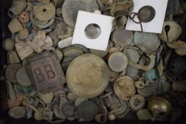 A collection of metal detector finds, including coins, buttons, etc.