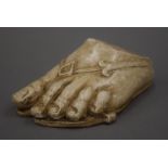 A plaster model of a foot. 16 cm long.