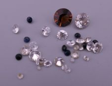A small quantity of loose gem stones.