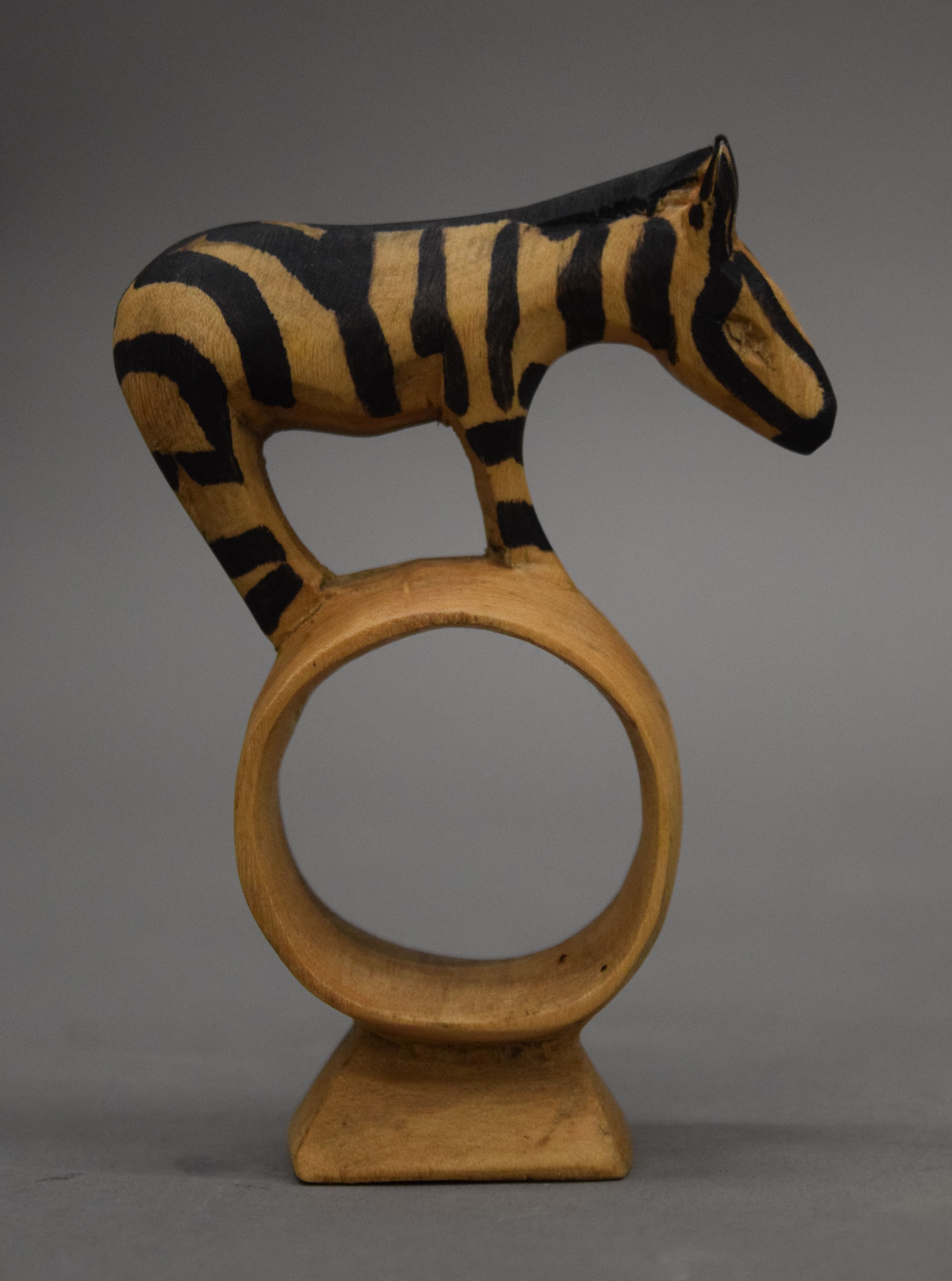 A set of napkin rings, each carved with an animal. - Image 2 of 4