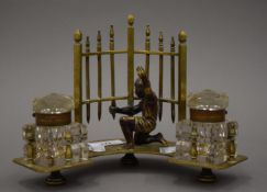 A Victorian brass anti-slavery desk stand,