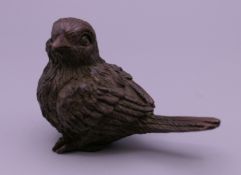 A bronze model of a bird. 3.5 cm high.