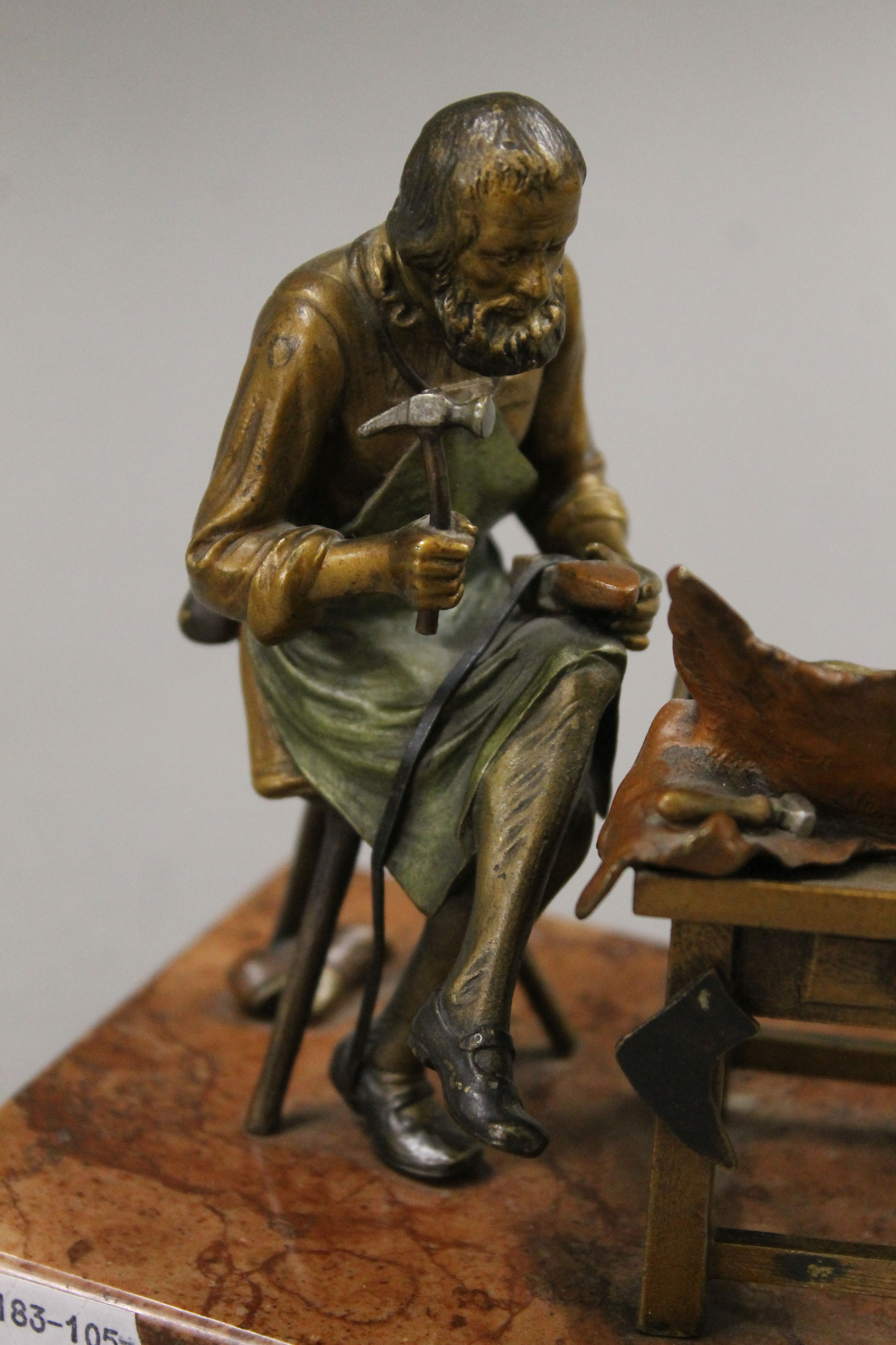 A cold painted bronze model of a cobbler mounted on a rouge marble base. 13.5 cm wide. - Image 4 of 6
