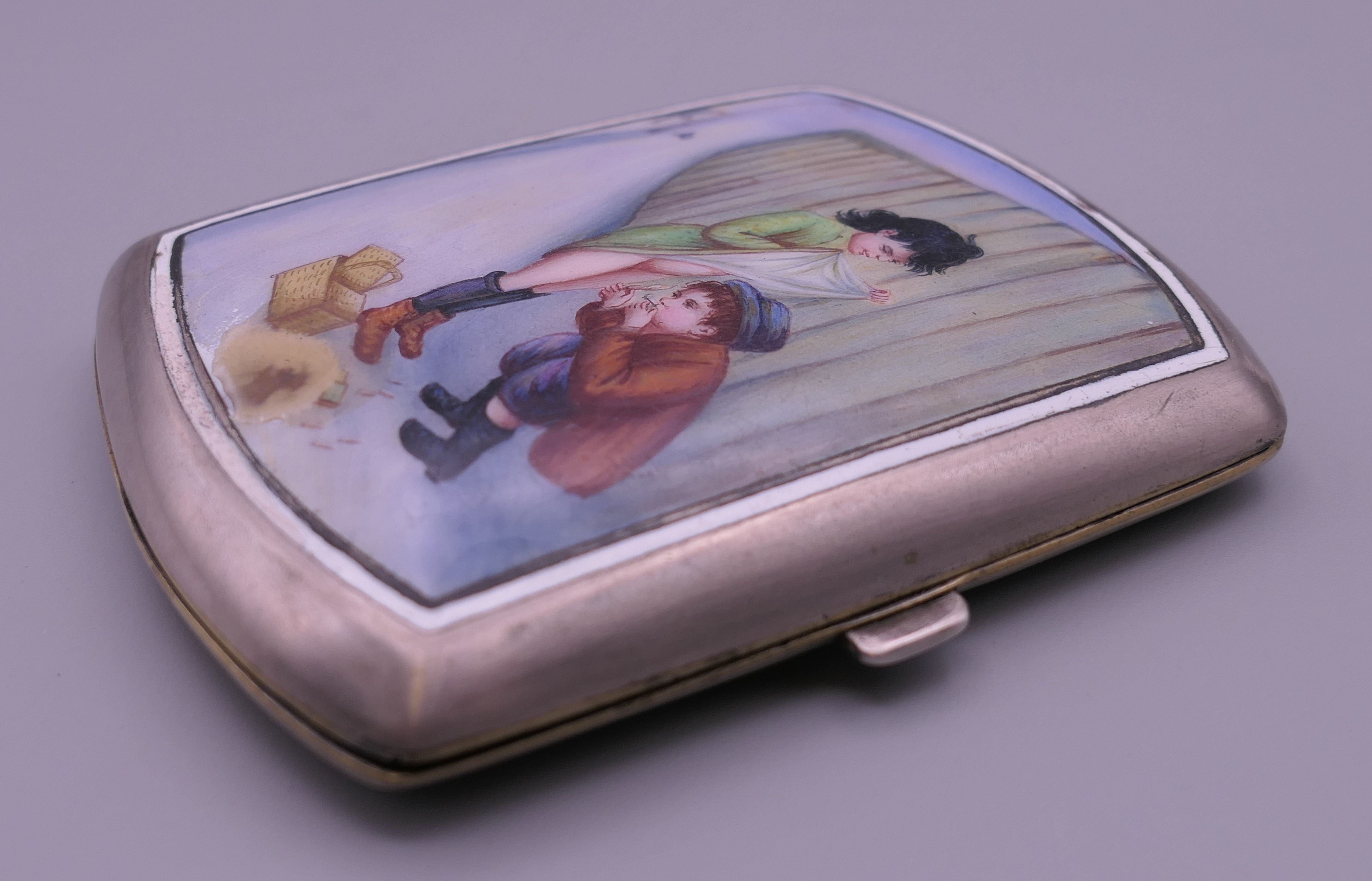A late 19th/early 20th century silver plated cigarette case with amusing enamel decoration. 7. - Image 3 of 7