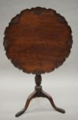 A 19th century mahogany tilt top tripod table. 63 cm diameter.