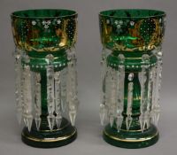 A pair of Victorian gilt decorated green glass lustres. 35.5 cm high.