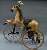 A tricycle formed as a horse. 85 cm high.