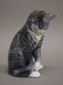 A large Royal Copenhagen model of a cat. 18 cm high.