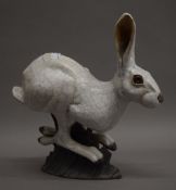 A Brian Andrews raku pottery hare. 31 cm high.