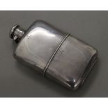 A large silver hip flask. 16.5 cm high. 308.3 grammes.