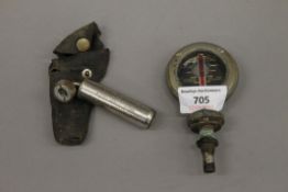 A vintage Boyce Motometer and a Schnader Balloon Tyre Gauge.