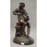 A large 19th century patinated bronze model of a potter, the base signed DROUOT. 51 cm high.