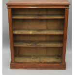 A Victorian walnut bookcase. 86 cm wide, 102 cm high.