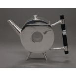 A Christopher Dresser style teapot. 14.5 cm high.