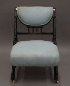 A Victorian aesthetic nursing chair. 47 cm wide.