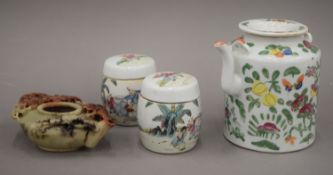 A carved soapstone teapot, a Cantonese teapot and a pair of Cantonese jars. The former 15.5 cm long.