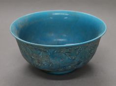 A Chinese turquoise glaze porcelain bowl. 15 cm diameter.