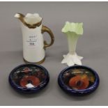 Two Moorcroft dishes, a Worcester vase and a Worcester ewer. The latter 15 cm high.