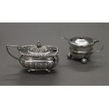 Two silver mustard pots. 89.6 grammes.