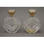 Two Lalique glass perfume bottles. 11 cm high.