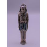 A late 19th/early 20th century Continental silver and enamel propelling pencil formed as a pharaoh.