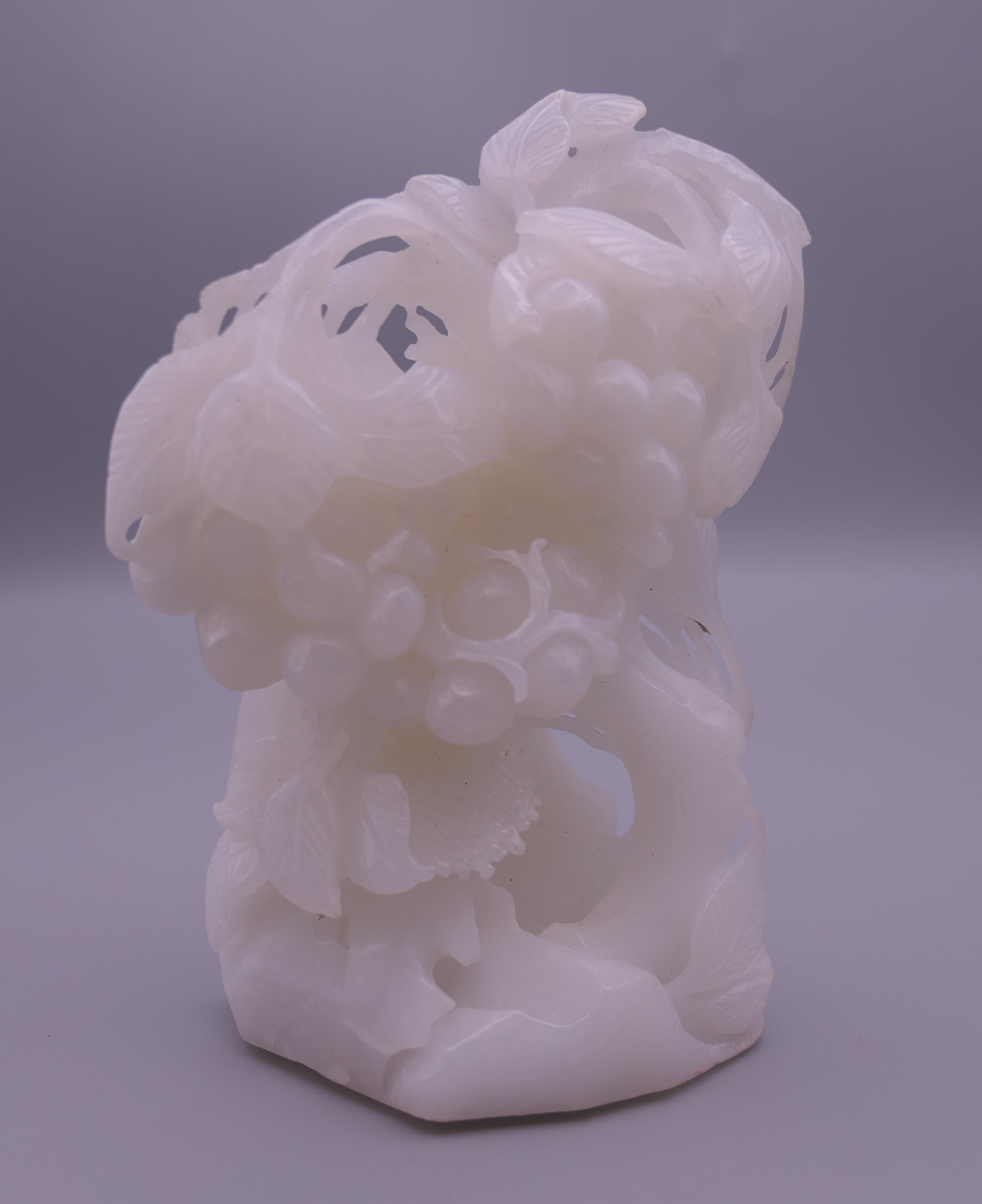 A small white jade carving. 11.5 cm high.