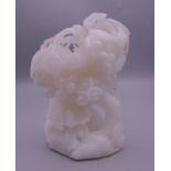 A small white jade carving. 11.5 cm high.