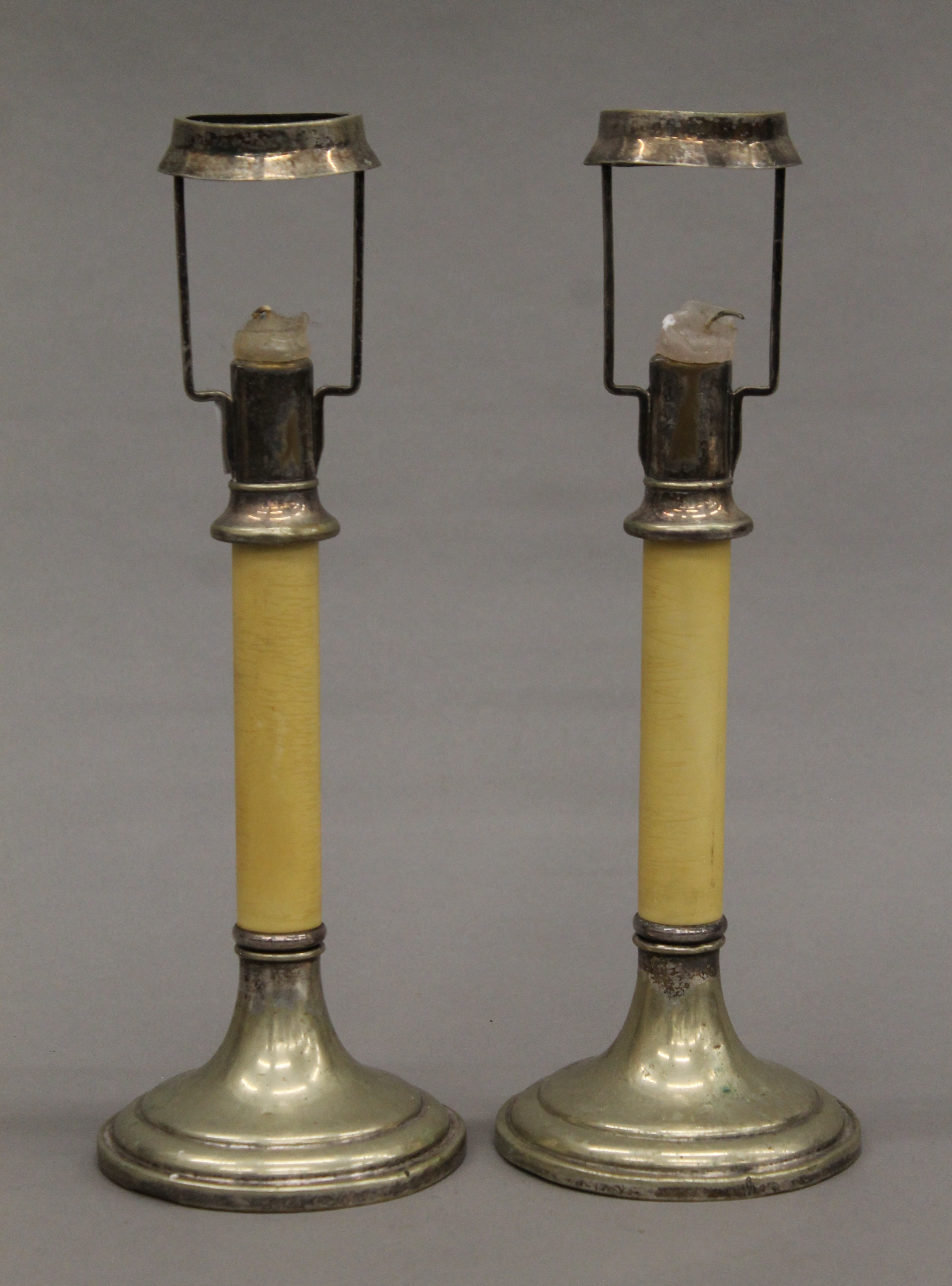 A pair of plated students lamps. 30 cm high.