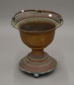 A 19th century copper bucket of waisted form. 37 cm high excluding handle.