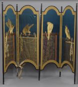 A 19th century Japanese embroidered silkwork four panel folding screen with black lacquered frame,