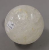 A rock crystal ball. 11 cm high.