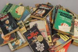 A quantity of James Bond paperbacks.