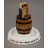 A Minton's ash tray advertising Guinness with central matchbox holder. 8.5 cm high.