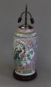 A Chinese pink ground porcelain lamp decorated with birds. 72 cm high overall.