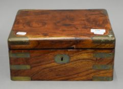 A Victorian brass bound walnut box. 28 cm wide.