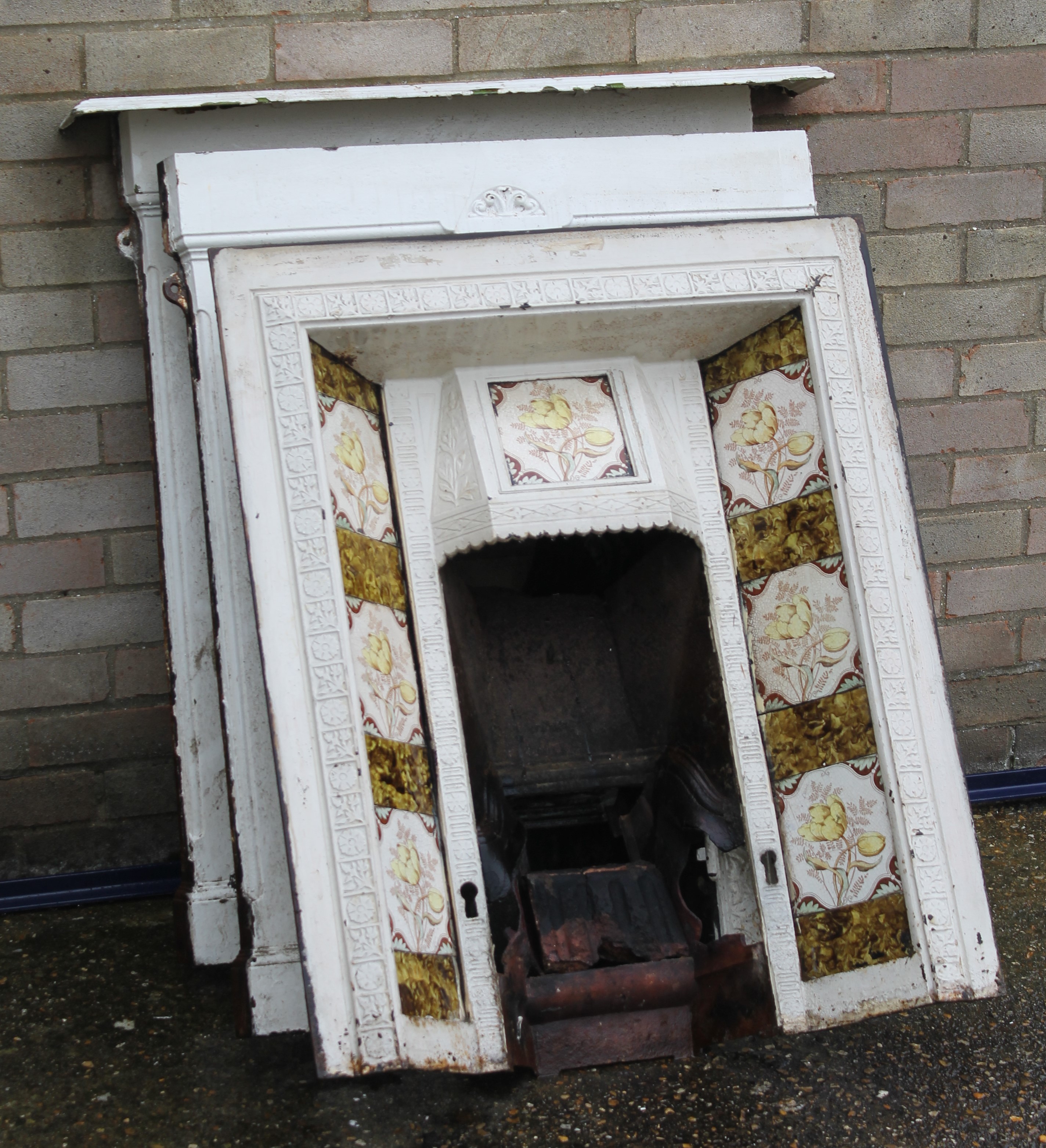 Three Victorian cast iron fire places.