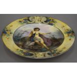 A Continental porcelain plate decorated with Venus and Bertine. 25 cm diameter.