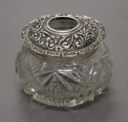 A silver topped hair tidy. 6 cm high.