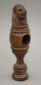 A 19th century treen lion formed nut cracker. 19 cm high.