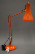 An orange No 90 anglepoise lamp.