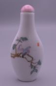 A Chinese porcelain snuff bottle. 7.5 cm high.