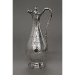 A Victorian silver ewer. 33 cm high. 19.8 troy ounces total weight.