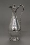 A Victorian silver ewer. 33 cm high. 19.8 troy ounces total weight.