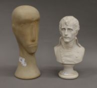 Two male busts, one pottery and the other resin. The largest 31 cm high.