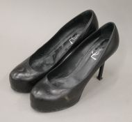 A pair of Yves St Laurent ladies shoes. UK Size 7.