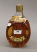 A bottle of Haigh Dimple Whisky. 21 cm high.