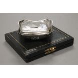 A cased set of silver teaspoons, a silver cigarette case and two plated bon bon dishes. 100.